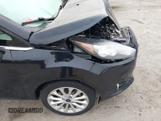 2017 Ford Fiesta Titanium with VIN 3FADP4FJ6HM112434, listed as a IAAI auction lot 41803424 with Not Provided miles and . Bid and sale history available at DreamBid. Image 6.