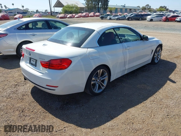 2015 BMW 4 Series 428i z VIN WBA3V7C58FP771642, wystawiony jako IAAI lot #42524828 z przebiegiem 64 440 mil mil oraz . Historia ofert i sprzedaży dostępna na DreamBid. Obrazek 4.