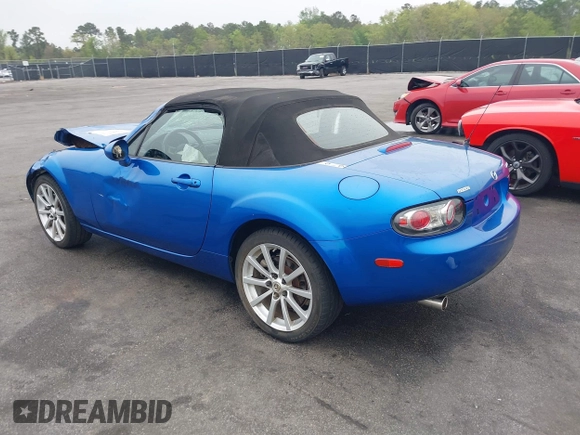 2006 Mazda MX-5 Miata Touring z VIN JM1NC25FX60102209, wystawiony jako IAAI lot #41940771 z przebiegiem 165 003 mil mil oraz . Historia ofert i sprzedaży dostępna na DreamBid. Obrazek 3.