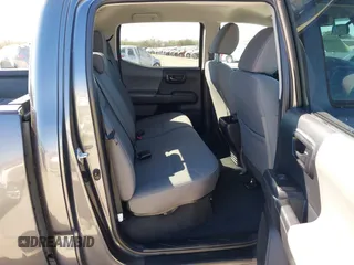 2023 Toyota Tacoma 4WD SR with VIN 3TYCZ5AN1PT146719, listed as a IAAI auction lot 41406963 with 19,735 mi miles. Bid and sale history available at carsss.com. Image 8.