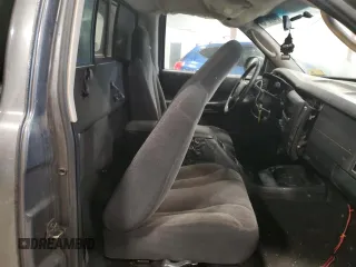 2003 Dodge Dakota z VIN 1D7GG16X23S204317, wystawiony jako Copart lot #54830745 z przebiegiem 139 508 mil mil oraz Szkoda całkowita • Salvage title. Historia ofert i sprzedaży dostępna na DreamBid. Obrazek 10.