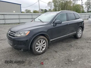 2014 Volkswagen Touareg Lux with VIN WVGEF9BP5ED005175, listed as a Copart auction lot 51815565 with 163,183 mi miles and Clean Title. Bid and sale history available at DreamBid. Image 1.