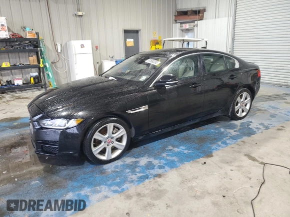 2017 Jaguar XE 25t Premium with VIN SAJAD4BG0HA971310, listed as a Copart auction lot 87680285 with 99,959 mi miles and Salvage Title. Bid and sale history available at carsss.com. Image 1.