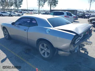2017 Dodge Challenger SXT Plus with VIN 2C3CDZAG5HH502354, listed as a IAAI auction lot 41740550 with 131,860 mi miles. Bid and sale history available at carsss.com. Image 3.