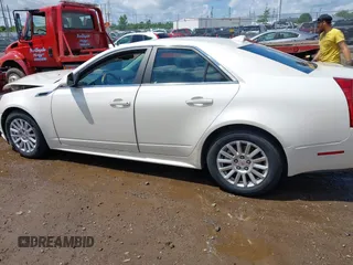 2012 Cadillac CTS Luxury with VIN 1G6DG5E57C0137409, listed as a IAAI auction lot 42633890 with 86,886 mi miles and . Bid and sale history available at DreamBid. Image 14.