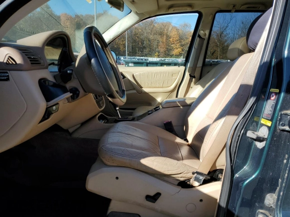 2001 Mercedes-Benz M-Class with VIN 4JGAB54E21A257928, listed as a Copart auction lot 77789424 with 98,228 mi miles and Clean Title. Bid and sale history available at carsss.com. Image 7.