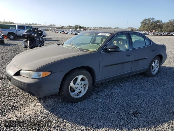 1997 Pontiac Grand Prix SE with VIN 1G2WJ52K5VF263791, listed as a Copart auction lot 78865814 with 134,430 mi miles and Salvage Title. Bid and sale history available at carsss.com. Image 1.