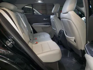 2022 Cadillac XT4 FWD Luxury z VIN 1GYAZAR48NF163967, wystawiony jako Copart lot #43148925 z przebiegiem 58 788 mil mil oraz Czysty tytuł • Clean title. Historia ofert i sprzedaży dostępna na DreamBid. Obrazek 11.
