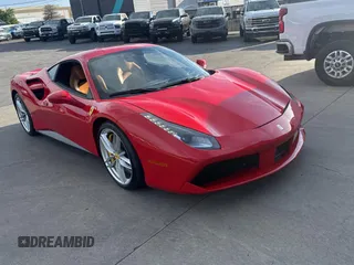 2016 Ferrari 488 z VIN ZFF79ALA0G0214884, wystawiony jako Copart lot #58627785 z przebiegiem 6311 mil mil oraz Szkody całkowita. Historia ofert i sprzedaży dostępna na DreamBid. Obrazek 1.