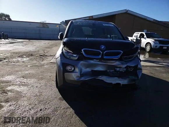 2015 BMW i3 with VIN WBY1Z4C56FV500991, listed as a Copart auction lot 43162913 with 57,885 mi miles. Bid and sale history available at carsss.com. Image 11.