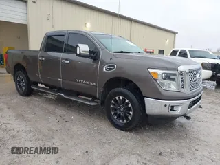 2016 Nissan Titan SL z VIN 1N6BA1F24GN507546, wystawiony jako IAAI lot #41544073 z przebiegiem 67 371 mil mil oraz . Historia ofert i sprzedaży dostępna na DreamBid. Obrazek 1.