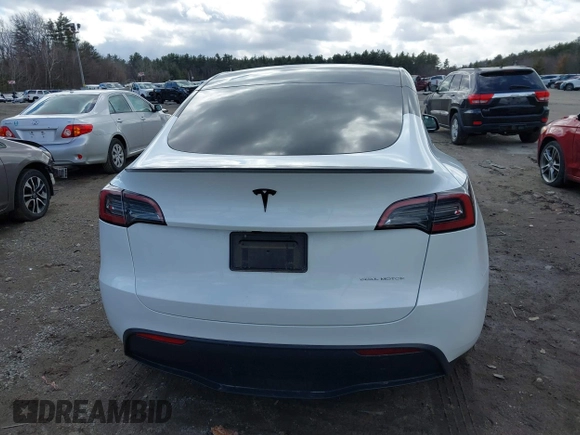 2023 Tesla Model Y Long Range with VIN 7SAYGDEE7PF832007, listed as a IAAI auction lot 41751598 with 14,126 mi miles and . Bid and sale history available at DreamBid. Image 16.