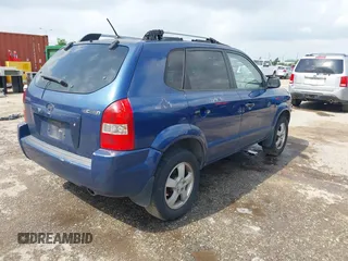 2006 Hyundai Tucson GL with VIN KM8JM12B66U342224, listed as a IAAI auction lot 42079428 with 196,248 mi miles. Bid and sale history available at carsss.com. Image 4.