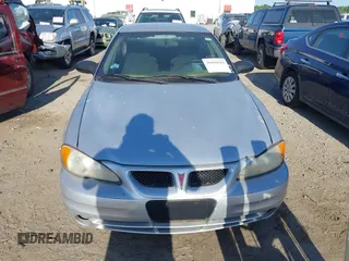 2004 Pontiac Grand Am SE with VIN 1G2NE52F74M684408, listed as a IAAI auction lot 39194361 with 169,247 mi miles. Bid and sale history available at carsss.com. Image 12.