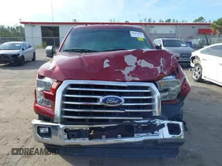 2015 Ford F-150 XLT with VIN 1FTEW1C87FKD70547, listed as a IAAI auction lot 41451841 with 151,596 mi miles and . Bid and sale history available at carsss.com. Image 13.