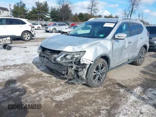 2018 Nissan Rogue S with VIN 5N1AT2MT2JC738034, listed as a IAAI auction lot 41286839 with 125,037 mi miles and . Bid and sale history available at DreamBid. Image 20.