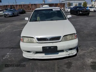 2002 Infiniti G20 Luxury z VIN JNKCP11A52T509667, wystawiony jako Copart lot #72986584 z przebiegiem 119 458 mil mil oraz Szkody całkowita. Historia ofert i sprzedaży dostępna na DreamBid. Obrazek 5.