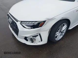 2023 Audi A4 S line Premium Plus z VIN WAUEAAF44PN007093, wystawiony jako IAAI lot #42071571 z przebiegiem 51 244 mil mil oraz . Historia ofert i sprzedaży dostępna na DreamBid. Obrazek 6.
