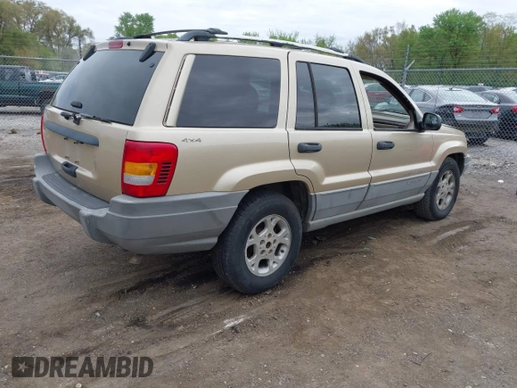 2000 Jeep Grand Cherokee Laredo with VIN 1J4GW48SXYC100248, listed as a IAAI auction lot 42182318 with 227,658 mi miles and . Bid and sale history available at DreamBid. Image 4.