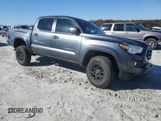 2020 Toyota Tacoma SR5 with VIN 3TMAZ5CN8LM134884, listed as a Copart auction lot 81489954 with 76,102 mi miles and Salvage title. Bid and sale history available at DreamBid. Image 4.