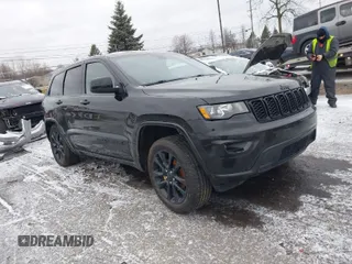 2020 Jeep Grand Cherokee Altitude with VIN 1C4RJFAG1LC225243, listed as a IAAI auction lot 41236515 with 93,343 mi miles. Bid and sale history available at carsss.com. Image 1.