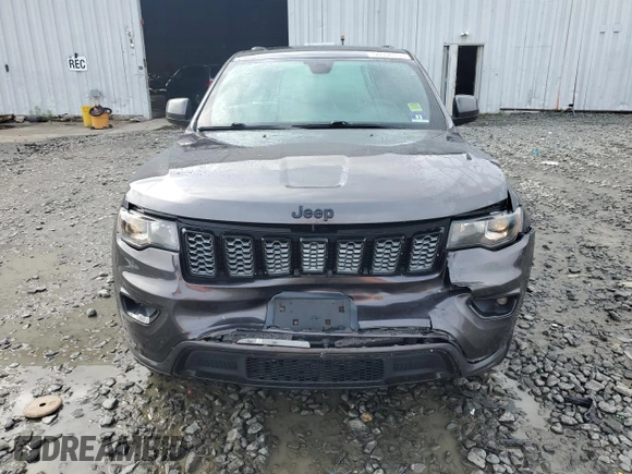2017 Jeep Grand Cherokee Altitude z VIN 1C4RJFAG9HC720250, wystawiony jako Copart lot #56956155 z przebiegiem 138 879 mil mil oraz Szkoda całkowita • Salvage title. Historia ofert i sprzedaży dostępna na DreamBid. Obrazek 5.