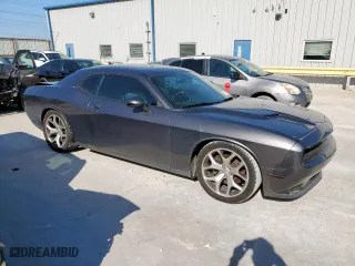 2015 Dodge Challenger SXT Plus with VIN 2C3CDZBG3FH913599, listed as a Copart auction lot 51167225 with 134,256 mi miles and Salvage Title. Bid and sale history available at carsss.com. Image 4.