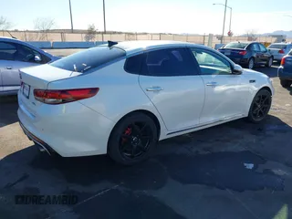 2016 Kia Optima SXL Turbo with VIN 5XXGV4L23GG115933, listed as a IAAI auction lot 41637267 with 83,348 mi miles. Bid and sale history available at carsss.com. Image 4.
