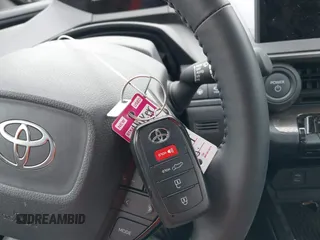 2024 Toyota Prius LE with VIN JTDACAAU8R3028529, listed as a IAAI auction lot 42079826 with 7,849 mi miles and . Bid and sale history available at DreamBid. Image 11.