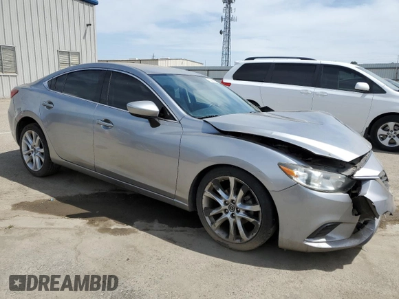 2014 Mazda 6 i Sport with VIN JM1GJ1U6XE1159917, listed as a Copart auction lot 52995325 with 97,652 mi miles and Salvage Title. Bid and sale history available at DreamBid. Image 4.