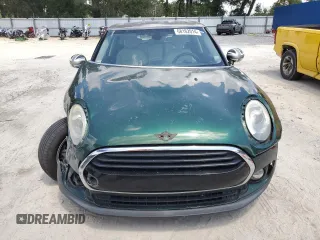 2016 MINI Clubman z VIN WMWLN5C5XG2E29275, wystawiony jako Copart lot #68162014 z przebiegiem 79 754 mil mil oraz Nie do naprawy. Historia ofert i sprzedaży dostępna na DreamBid. Obrazek 5.