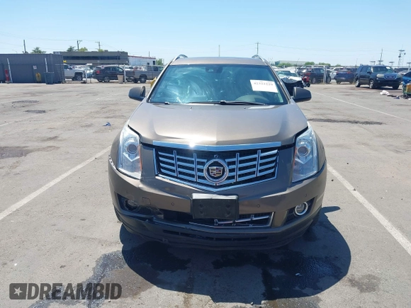 2015 Cadillac SRX Performance Collection with VIN 3GYFNFE35FS569682, listed as a IAAI auction lot 42322229 with 124,365 mi miles and . Bid and sale history available at DreamBid. Image 12.