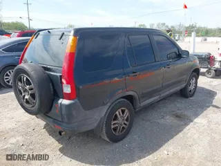 2003 Honda CR-V EX with VIN SHSRD77823U136760, listed as a IAAI auction lot 42083956 with 272,420 mi miles. Bid and sale history available at carsss.com. Image 4.