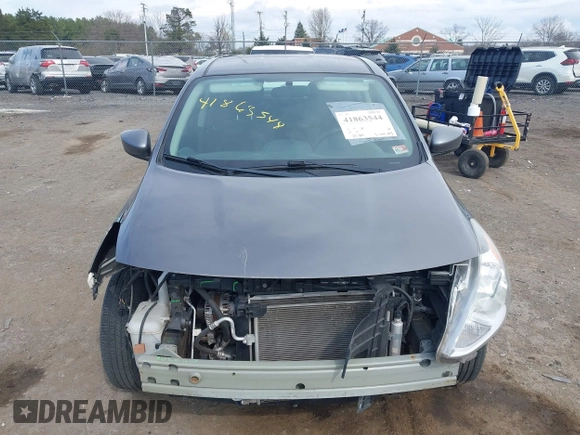 2019 Nissan Versa SV with VIN 3N1CN7AP7KL863891, listed as a IAAI auction lot 41863544 with 90,000 mi miles and . Bid and sale history available at DreamBid. Image 6.