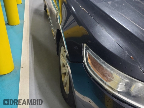 2011 Ford Taurus Limited with VIN 1FAHP2FW0BG147778, listed as a IAAI auction lot 42666687 with 283,665 mi miles and . Bid and sale history available at DreamBid. Image 31.