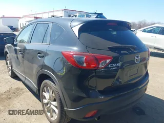2014 Mazda CX-5 Grand Touring with VIN JM3KE4DY1E0339690, listed as a IAAI auction lot 41668780 with 216,825 mi miles. Bid and sale history available at carsss.com. Image 3.