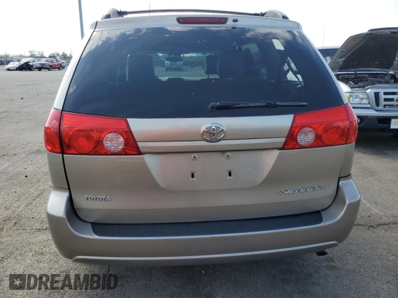 2010 Toyota Sienna XLE with VIN 5TDYK4CCXAS330463, listed as a Copart auction lot 52581315 with 226,668 mi miles and Salvage Title. Bid and sale history available at carsss.com. Image 6.
