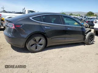 2018 Tesla Model 3 Long Range Battery z VIN 5YJ3E1EBXJF073250, wystawiony jako Copart lot #55832885 z przebiegiem 50 196 mil mil oraz Szkoda całkowita • Salvage title. Historia ofert i sprzedaży dostępna na DreamBid. Obrazek 3.