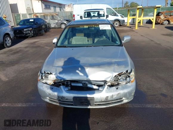 2002 Honda Accord SE with VIN 1HGCG56712A064900, listed as a IAAI auction lot 42184540 with Not provided miles and . Bid and sale history available at DreamBid. Image 12.