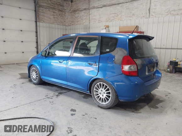 2007 Honda Fit Sport with VIN JHMGD37637S009481, listed as a IAAI auction lot 42519956 with 127,066 mi miles and . Bid and sale history available at DreamBid. Image 3.