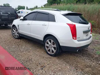 2010 Cadillac SRX Premium Collection z VIN 3GYFNCEY4AS569787, wystawiony jako IAAI lot #42524167 z przebiegiem 222 000 mil mil oraz . Historia ofert i sprzedaży dostępna na DreamBid. Obrazek 3.