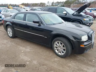 2009 Chrysler 300 Touring with VIN 2C3KA53V59H592213, listed as a IAAI auction lot 41663708 with 77,176 mi miles. Bid and sale history available at carsss.com. Image 1.