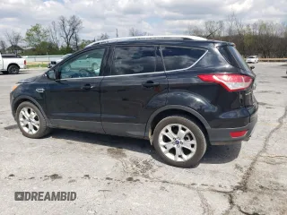 2015 Ford Escape Titanium z VIN 1FMCU0J94FUC07857, wystawiony jako Copart lot #52682825 z przebiegiem 62 100 mil mil oraz Szkoda całkowita • Salvage title. Historia ofert i sprzedaży dostępna na DreamBid. Obrazek 2.