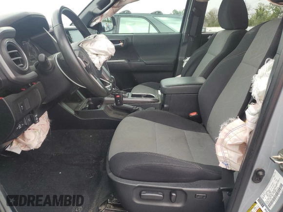 2020 Toyota Tacoma SR5 with VIN 3TMAZ5CNXLM121344, listed as a Copart auction lot 59393395 with 69,902 mi miles and Salvage title. Bid and sale history available at DreamBid. Image 7.