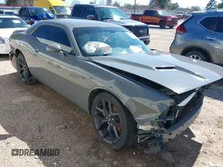 2019 Dodge Challenger SXT z VIN 2C3CDZAG9KH509055, wystawiony jako IAAI lot #41575767 z przebiegiem 112 538 mil mil oraz . Historia ofert i sprzedaży dostępna na DreamBid. Obrazek 1.