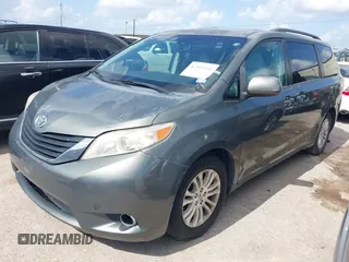 2014 Toyota Sienna XLE with VIN 5TDYK3DC2ES448876, listed as a IAAI auction lot 42519351 with 154,601 mi miles and . Bid and sale history available at DreamBid. Image 18.