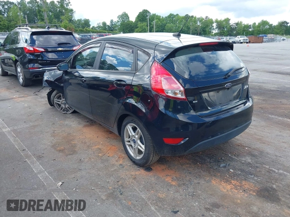 2019 Ford Fiesta SE z VIN 3FADP4EJ7KM102259, wystawiony jako IAAI lot #42265135 z przebiegiem 94 445 mil mil oraz . Historia ofert i sprzedaży dostępna na DreamBid. Obrazek 3.