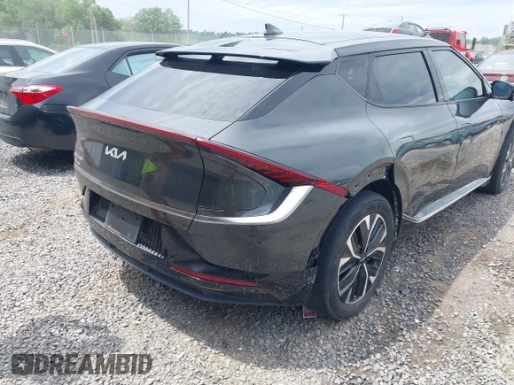 2022 Kia EV6 Wind z VIN KNDC3DLC5N5034625, wystawiony jako IAAI lot #42263100 z przebiegiem 35 412 mil mil oraz . Historia ofert i sprzedaży dostępna na DreamBid. Obrazek 4.