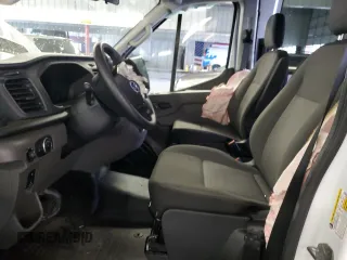 2024 Ford Transit Cargo with VIN 1FTBR1C88RKA39474, listed as a Copart auction lot 86339884 with Not Provided miles and Salvage Title. Bid and sale history available at DreamBid. Image 7.