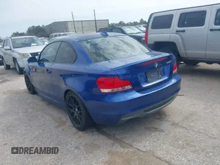 2008 BMW 1 Series 135i with VIN WBAUC73598VF23878, listed as a IAAI auction lot 41569879 with 186,622 mi miles. Bid and sale history available at carsss.com. Image 3.